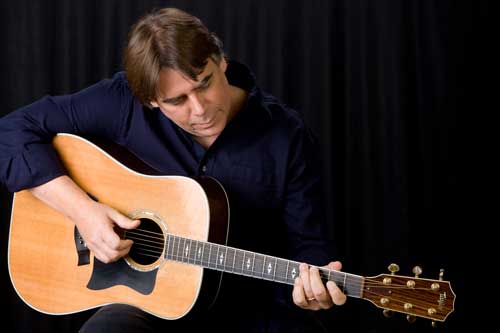 Chris Gage on guitar by Carrell Grigsby